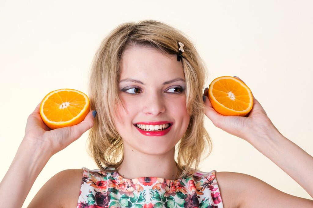 Woman Oranges Portrait Fruits  - olga-filo / Pixabay